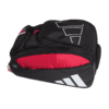 Die Adidas Multigame 3.3 2024 Padeltasche ist ein stylischer Sportrucksack in Schwarz, verziert mit weißen geometrischen Mustern und einem markanten roten Reißverschlussfach. Mit seinen mehreren Fächern ist er ideal für den sicheren und eleganten Transport von Sportgeräten.