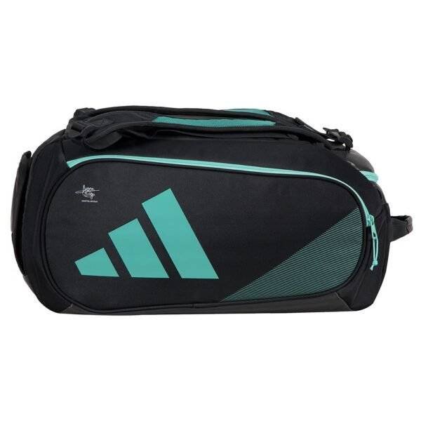 Die Adidas Tour Anthrazit 2024 Padeltasche ist eine schwarze Reisetasche mit einem großen blaugrünen geometrischen Design an der Seite und einem kleinen Logo oben. Sie verfügt über mehrere Reißverschlüsse und Schultergurte zum einfachen Tragen und ist somit perfekt für Ihre Tourutensilien.